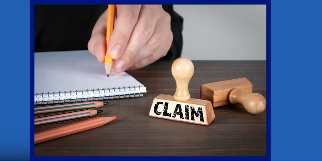 “Person writing notes beside a claim stamp and documents, illustrating the process of filing Successful Claims Against The NHS for medical negligence compensation.” 