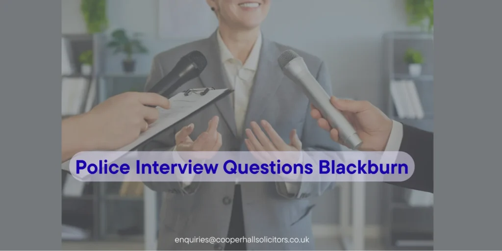 Police Interview Questions Blackburn banner showing a solicitor speaking while microphones are held in front during a legal interview and criminal defence consultation. 
