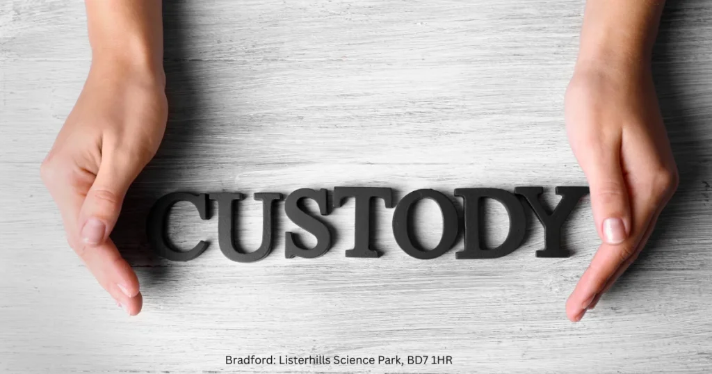 Two hands surrounding the word Custody, representing remanded custody under UK criminal law, pre-trial detention, court custody decisions, and the importance of legal representation during criminal proceedings. 